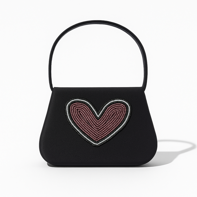Black handbag with a beaded heart design