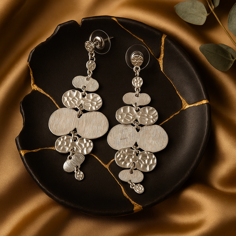 Silver-toned multi-disc chandelier drop earrings.