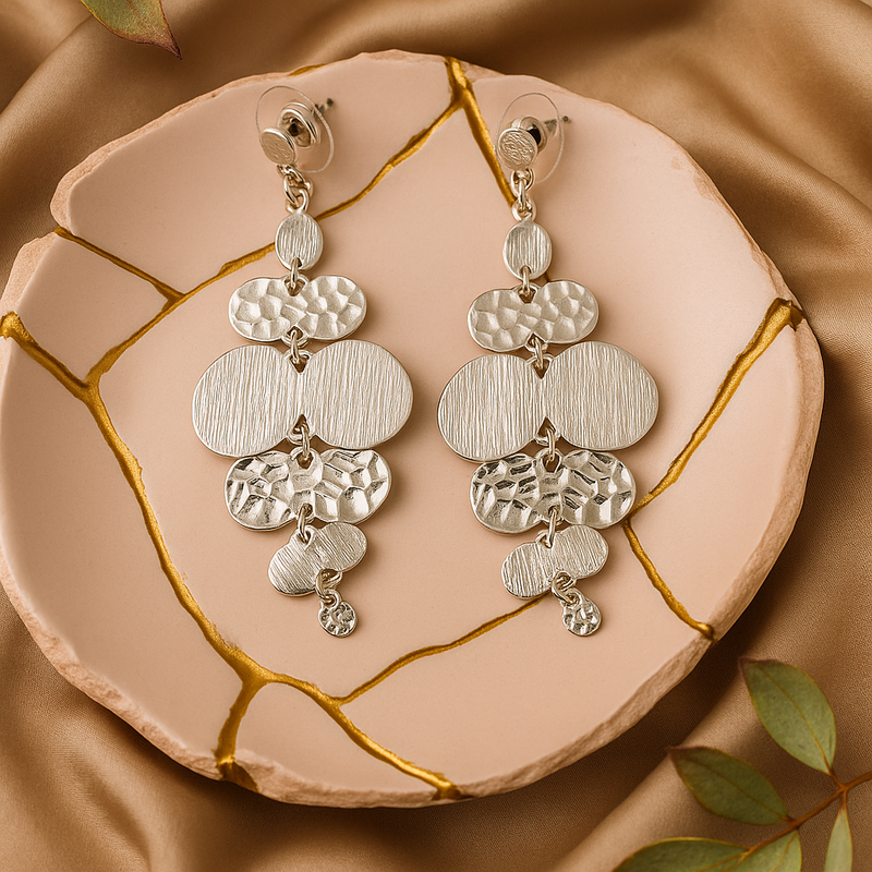 Silver-toned multi-disc chandelier drop earrings.