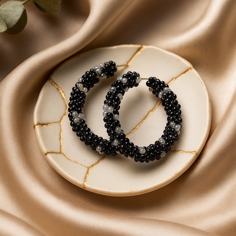 Black and Silver-Toned Beaded Hoop Earrings.